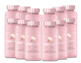 A picture of multiple pink bottles of Hairtamin products