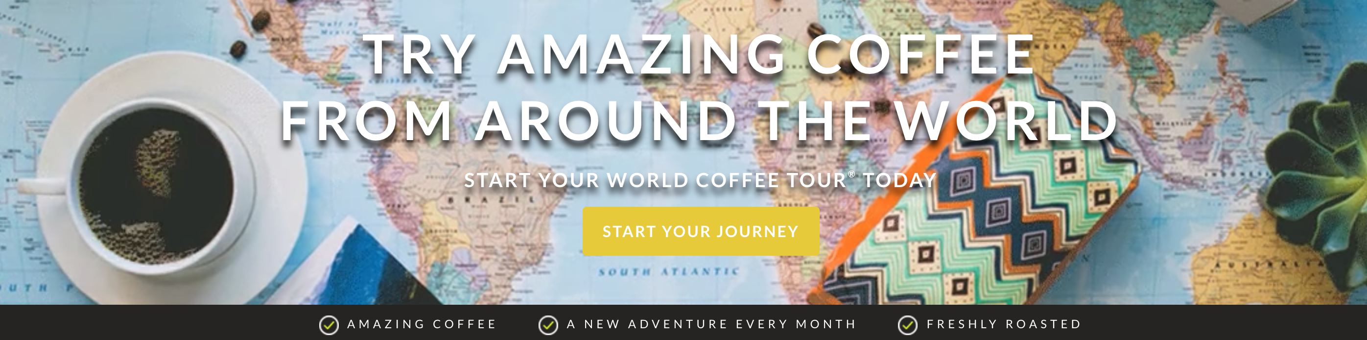A cup of coffee on top of a map of the world